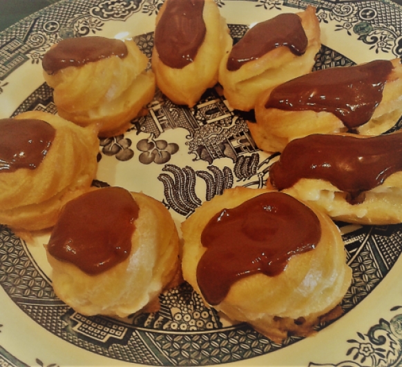 Palos de crema con cobertura de chocolate