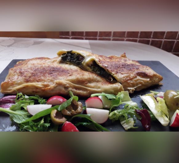 CANELONES DE ESPINACAS CON PASAS Y PIÑONES